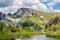 photo of view of Picturesque summer mountain landscape with a lake and an impressive peak in the background. One of the Urdini Lakes and Malyovitsa Peak in Rila Mountain, Bulgaria.,Kyustendil bulgaria.