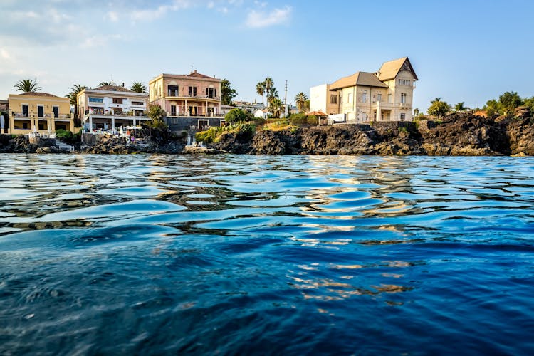Photo of beautiful luxury houses just in front of the sea, Catania, Italy.