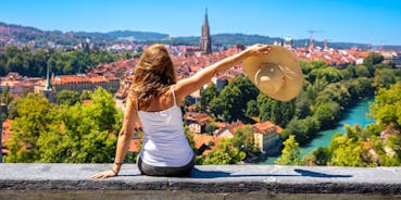 Panoramic view of historic Zurich city center with famous Fraumunster, Grossmunster and St. Peter and river Limmat at Lake Zurich on a sunny day with clouds in summer, Canton of Zurich, Switzerland