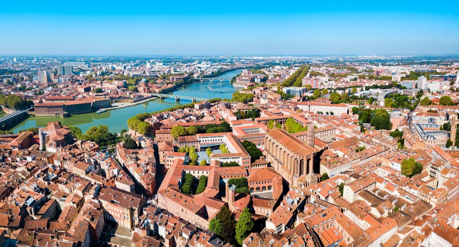 Photo of Toulouse and Garonne river aerial panoramic view.