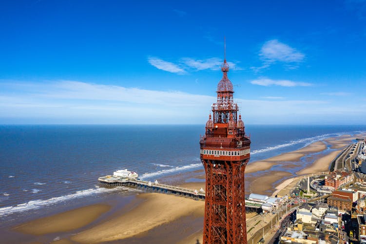 Photo of famous Blackpool Tower and beach from the sky on a beautiful Summers day on Blackpool ,England.