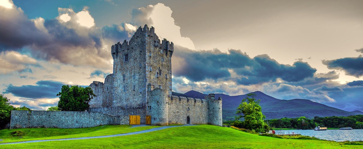 Idyllic landscape of Ross Castle in the Killarney National Park in Ireland. Travel by car through the Ring of Kerry.