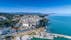 Photo of Aerial view of the white tall apartment buildings of the coast of Chioggia in Italy.