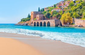 Photo of Kizil Kule or Red Tower and port aerial panoramic view in Alanya city, Antalya Province on the southern coast of Turkey.