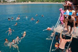 A lato: tour in barca dell'Isola dei Delfini con schiuma party e pranzo