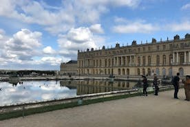Excursão privada ao Palácio Real e Jardins de Versalhes em carrinho de golfe