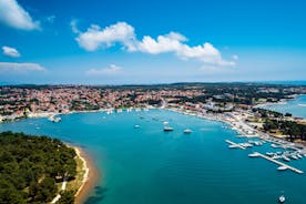 Photo of aerial view of beautiful town of Medulin waterfront view, Istria region of Croatia.