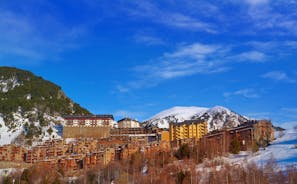 photo of Mountains in Androrra and ski cable car over the valley of Soldeu - Pas de la Casa.