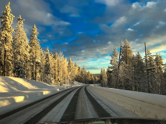 Photo of beautiful road in finish Lapland during sunrise, Kolari.