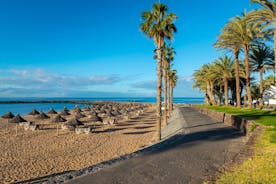 photo of aerial view of the beach and lagoon of Los Cristianos resort on Tenerife, Canary Islands, Spain.