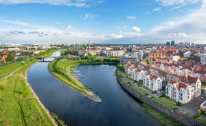 Photo of aerial view of Torun old town with Vistula river, Poland.