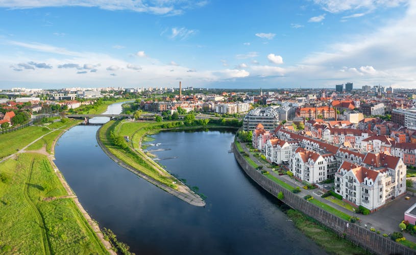 Photo of Poznan, Poland. Aerial view of Warta river and residential buildings in the district of Old Port.