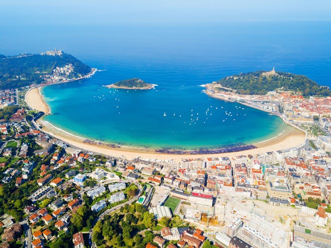 Photo of Santa Clara Island and San Sebastian Donostia city aerial panoramic view, Basque country in Spain.