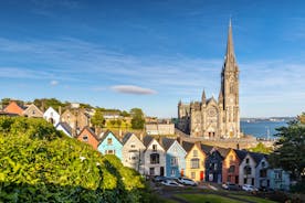  Cork, Ireland. Fishing boats inside the port of Cobh. A city with colorful houses in Ireland.