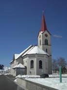 photo of the villages Schwyz and Rickenbach with the mountains Grosser Mythen and Kleiner Mythen in the background in Switzerland.