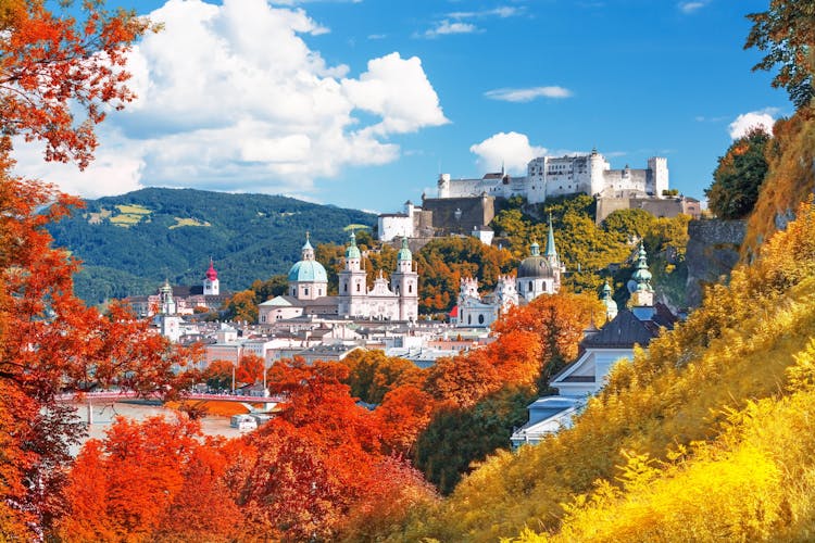 Photo of beautiful scenic view on Salzburg skyline with Festung Hohensalzburg in the summer.