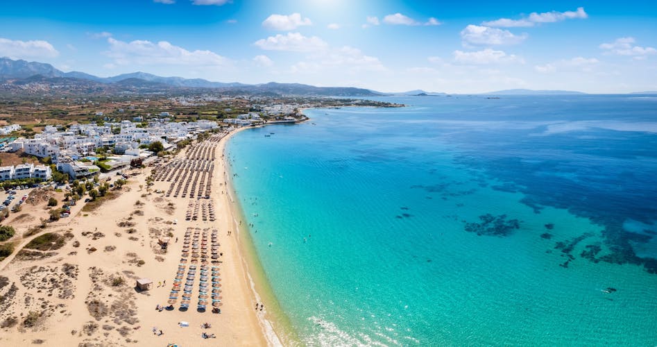 Photo of panoramic aerial view of the popular Agios Prokopios beach at Naxos island, Cyclades, Greece.