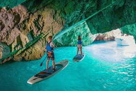 Capri: Faraglioni-rotsen en Blue Grotto paddleboard-tour