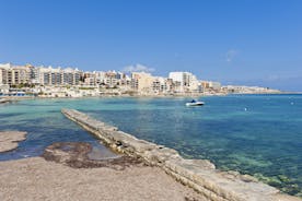 Photo of panoramic aerial view of St. Paul bay with acropolis of Lindos in background ,Rhodes, Greece.