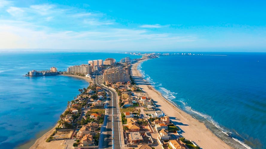 Photo of aerial view. Panoramic view of streets, roads and buildings foreland La Manga del Mar Menor, Cartagena, Murcia, Spain.