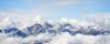 photo of aerial panoramic view of Snowy Nordkette mountain of Innsbruck, Austria.
