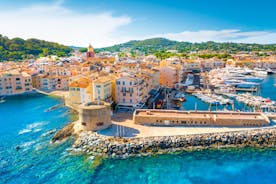 Photo of beautiful aerial view of Saint-Tropez, France with seascape and blue sky.