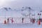 photo of panoramic view of Erciyes Ski Resort with people skiing on the ski slope in Kayseri, Turkey.