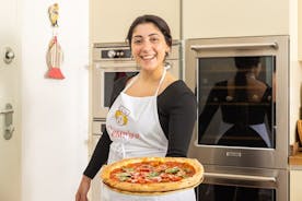 Clases privadas de pizza y tiramisú en la casa de una Cesarina con degustación en Turín