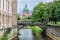 photo of view of New Town Hall or Neues Rathaus and the Leineschlossbrücke bridge over the river Leine in Hanover, Germany