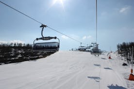 photo of panorama of ski resort with ski slopes and approaching snowstorm in Geilo, Norway.