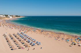 Photo of aerial amazing view of town Olhos de Agua, Algarve Portugal.