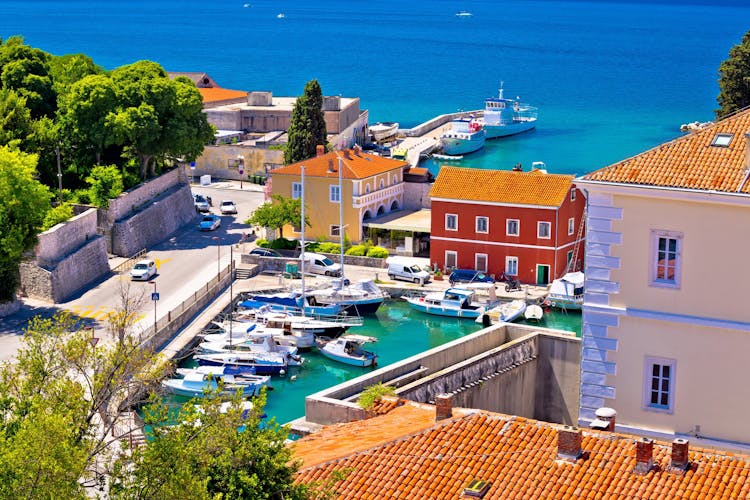 Photo of famous Fosa harbor in Zadar aerial view.