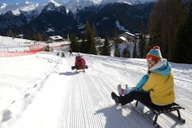 The most famous sledge slope in the Dolomites and a panoramic tour by car
