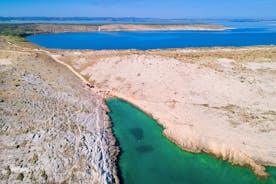 Photo of aerial view of Zaton tourist waterfront and Velebit mountain background, Dalmatia region of Croatia.