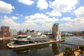 Aerial drone view of Manchester city in UK on a beautiful sunny day.