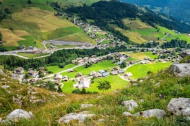 photo of Annecy city center panoramic aerial view with the old town, castle, Thiou river and mountains surrounding the lake, beautiful summer vacation tourism destination in France, Europe.