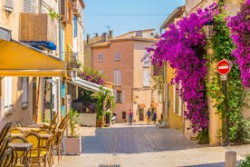 Photo of beautiful aerial view of Saint-Tropez, France with seascape and blue sky.