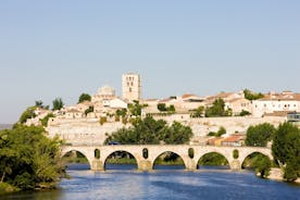 Photo of San Salvador Cathedral of Zamora and acenas (water mills), view from Duero river. Castilla y Leon, Spain.