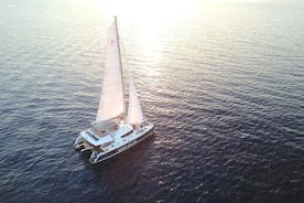 Santorini Luxury Catamaran Sunset Cruise with BBQ, Drink and Transfer