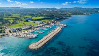 Photo of aerial view on clear blue water of Coral bay in Peyia, Cyprus.