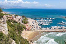 Photo of Umbrellas and sunbeds in San Felice Circeo, Italy.