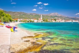 Photo of aerial view of Stobrec popular touristic destination on Adriatic sea, suburb of city of Split, Croatia.