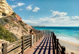 photo of aerial panoramic drone point of view Cabo Roig coastline with blue Mediterranean Seascape view, residential buildings near sandy beach at sunny summer day. Province of Alicante, Costa Blanca. Spain.