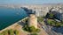 Photo of aerial drone view of iconic historic landmark ,old byzantine White Tower of Thessaloniki or Salonica, North Greece.
