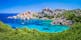 Photo of Bizarre granite rock and azure bay in beautiful beach at Capo Testa, Sardinia, Italy.
