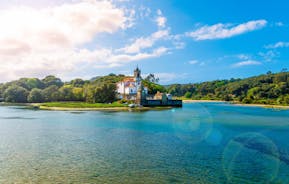 Photo of Ballota beach with the islet Castro, Llanes,  Spain.