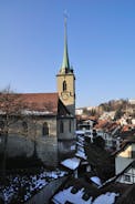 Bern, Switzerland. View of the old city center and Nydeggbrucke bridge over river Aare.