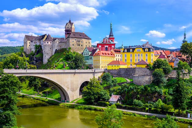 Photo of colorful town and Castle Loket over Eger river in the near of Karlovy Vary, Czech Republic.
