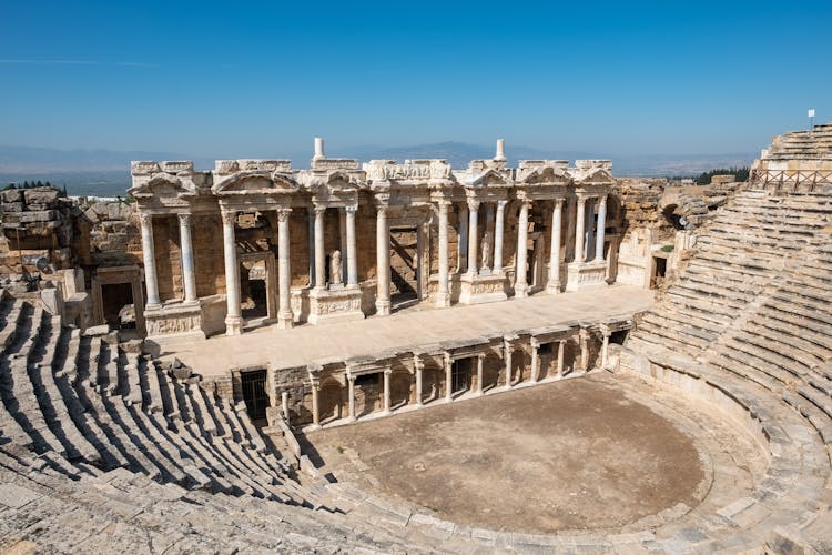 Photo of Denizli, Turkey. Ruins of a large amphitheater in the ancient city of Hierapolis near Pamukkale.