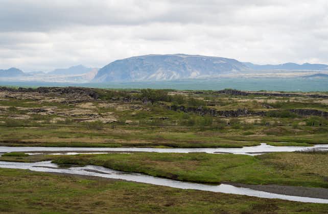 photo of The Lögberg Fault at Thingvellir National Park in Iceland During a Foggy Summer Day.